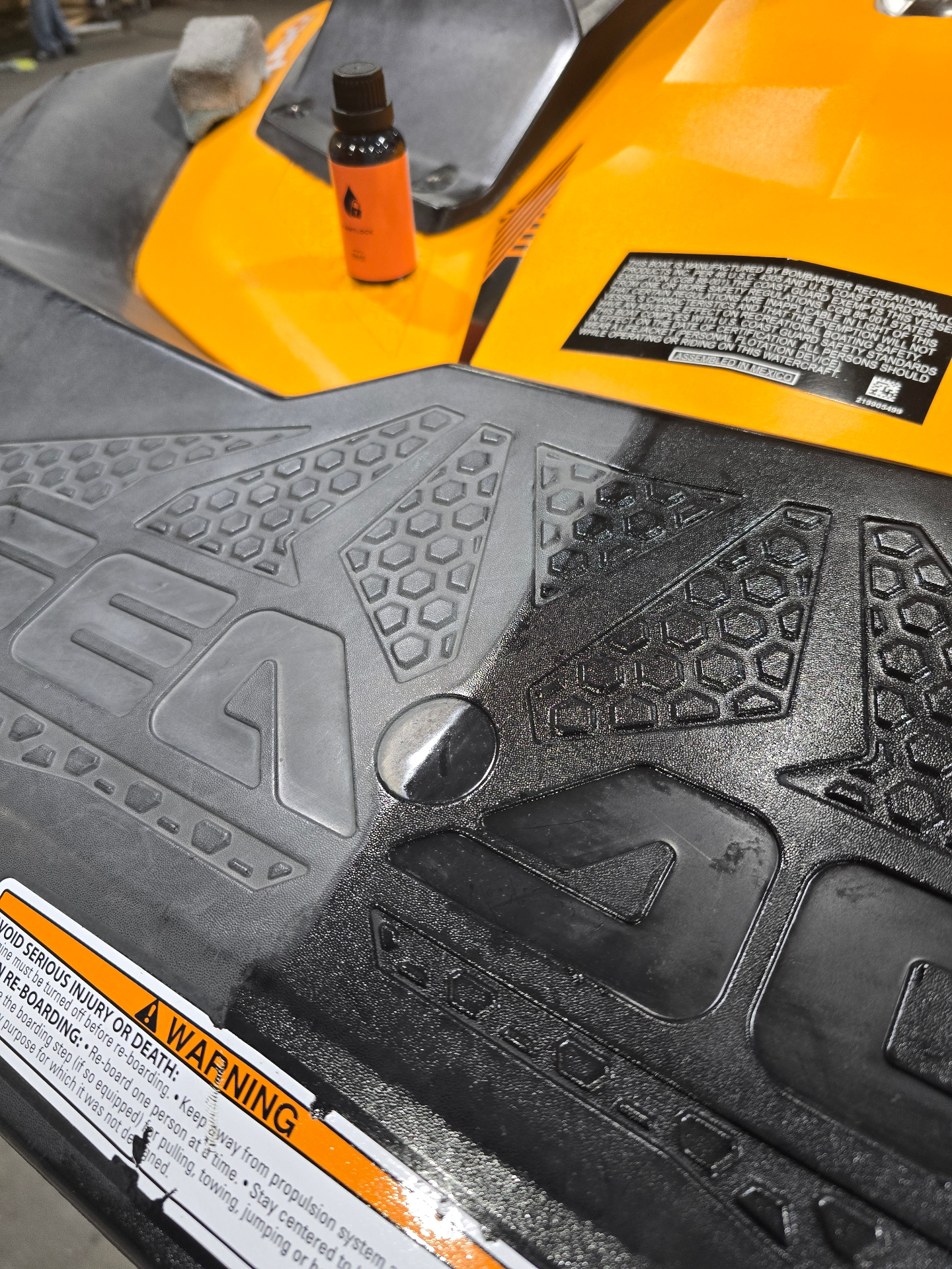 Roar protective coating being applied to a Sea-Doo jet ski